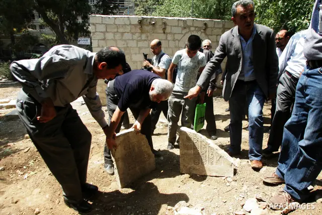 Palestinians and Israeli Arab kenaset members take a part in a protest to the Israeli violations of the Islamic Sanctities in Jerusalem on June 27, 2011. where washed away and destroyed yesterday about 100 grave in "Maam...