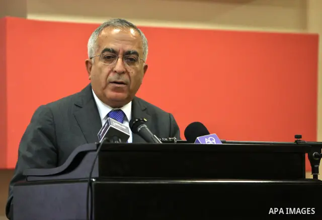 Palestinian Prime Minister, Salam Fayyad reports a speech during the First Islamic Jerusalem conference in the West Bank city of Ramallah on June 27, 2011. Photo by Mustafa Abu Dayeh