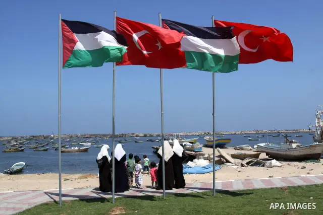 Palestinians gather in the port of Gaza during the end of the preparations to receive the Freedom flotilla "2" in Gaza city on June 28, 2011. Photo by Mohammed Asad
