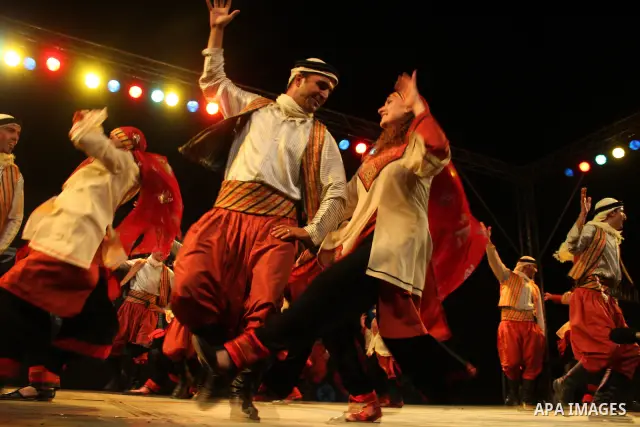Palestinian dancers from the Wishah Popular Dance Troupe perform the festival "nights of Birzeit" at Birzeit University in the West Bank city of Ramallah on June 28, 2011. Photo by Issam Rimawi