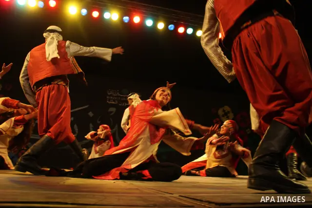 Palestinian dancers from the Wishah Popular Dance Troupe perform the festival "nights of Birzeit" at Birzeit University in the West Bank city of Ramallah on June 28, 2011. Photo by Issam Rimawi