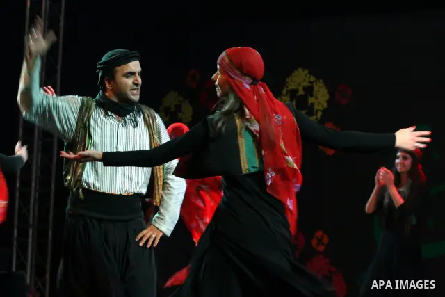 Palestinian dancers from the Wishah Popular Dance Troupe perform the festival "nights of Birzeit" at Birzeit University in the West Bank city of Ramallah on June 28, 2011. Photo by Issam Rimawi