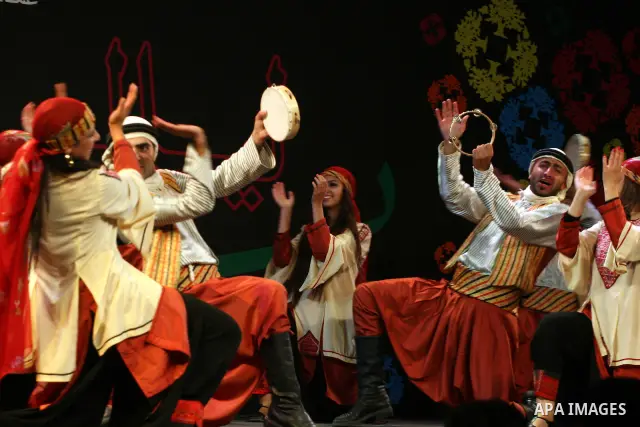 Palestinian dancers from the Wishah Popular Dance Troupe perform the festival "nights of Birzeit" at Birzeit University in the West Bank city of Ramallah on June 28, 2011. Photo by Issam Rimawi