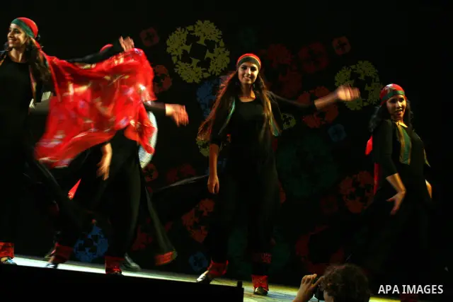 Palestinian dancers from the Wishah Popular Dance Troupe perform the festival "nights of Birzeit" at Birzeit University in the West Bank city of Ramallah on June 28, 2011. Photo by Issam Rimawi