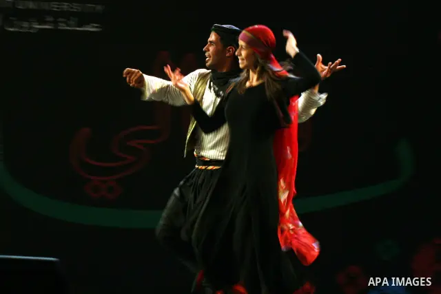 Palestinian dancers from the Wishah Popular Dance Troupe perform the festival "nights of Birzeit" at Birzeit University in the West Bank city of Ramallah on June 28, 2011. Photo by Issam Rimawi