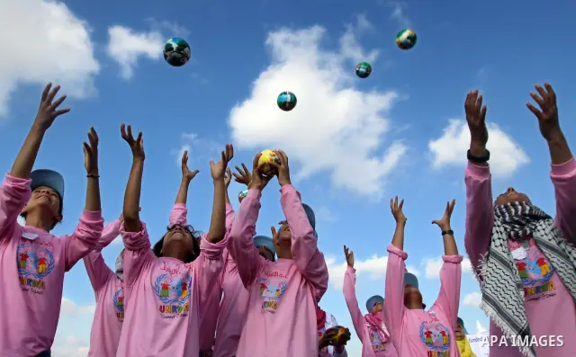 Palestinian children play with balls during summer camp activities supervised by the UN Relief and Works Agency (UNRWA) in Khan Yunis in the southern Gaza Strip on June 30, 2011. Photo by Ali Jadallah