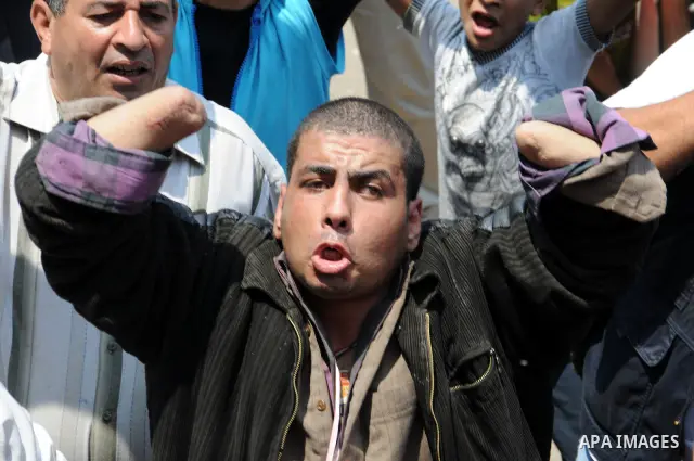 Egyptians take part in a rally after prayer at Tahrir Square in Cairo, Egypt, on July 1, 2011. Hundreds of people were rallying in the square, that was the epicenter of the uprising that toppled Hosni Mubarak, demanding...