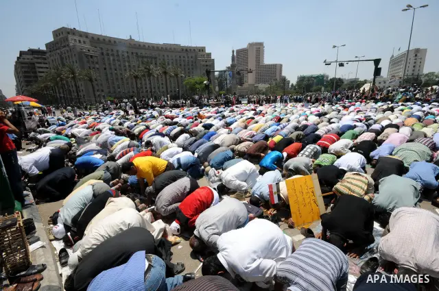 Egyptians attend Friday prayers at Tahrir Square in Cairo, Egypt, on July 1, 2011. Hundreds of people were rallying in the square, that was the epicenter of the uprising that toppled Hosni Mubarak, demanding speedy trial...