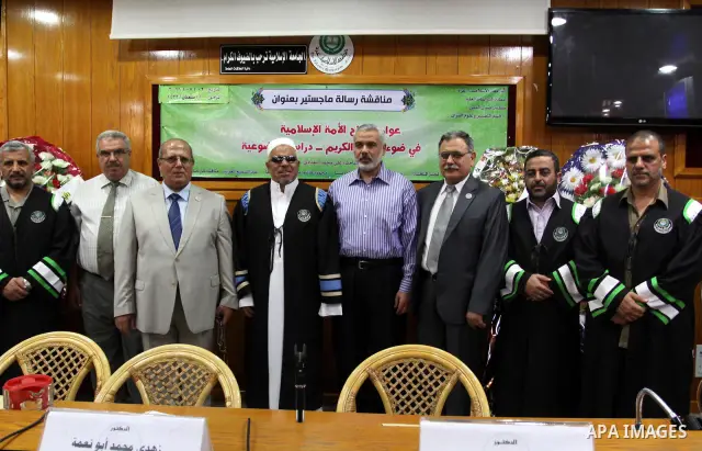 Palestinian Prime Minister in Gaza strip, Ismail Haniya attends the discussion of the Master of blind students at the Islamic University in Gaza city on July 2, 2011. Photo by Mohammed Asad