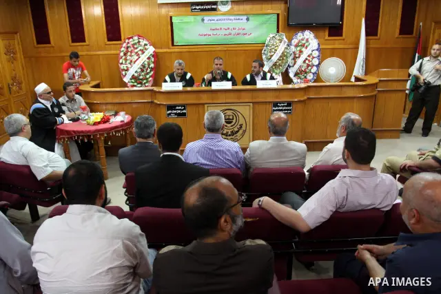 Palestinian Prime Minister in Gaza strip, Ismail Haniya attends the discussion of the Master of blind students at the Islamic University in Gaza city on July 2, 2011. Photo by Mohammed Asad