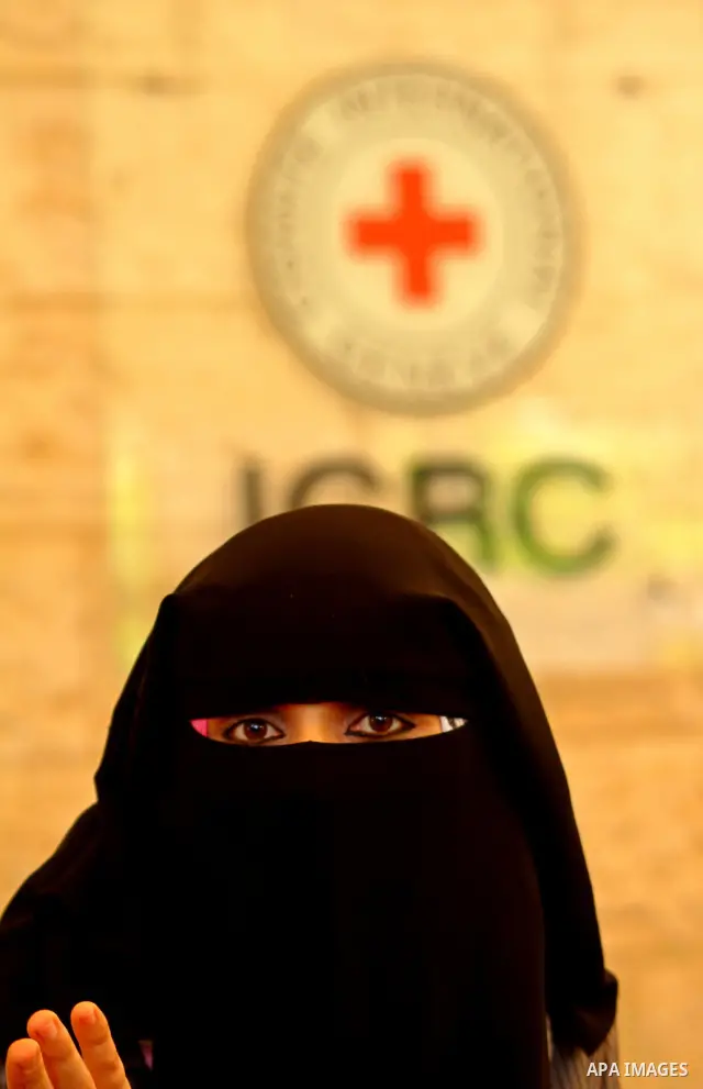A Palestinian woman takes a part in a protest calling for the release of the prisoners in Israeli jails in front of the Red Cross in Gaza city on July 4, 2011. Israel currently holds about 5,600 Palestinian prisoners in...