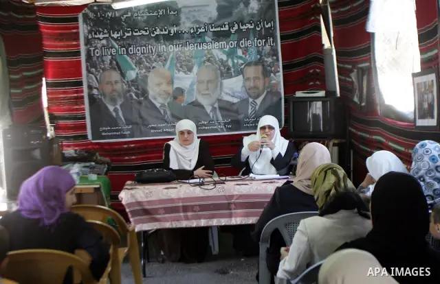 Palestinian deputies women deliver a speech about Jerusalem during a celebration in the international Red Cross Center in Jerusalem on July 4, 2011. Photo By Mahfuz Abu Turk