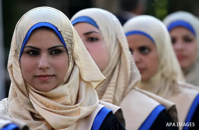 Palestinian students participate in their graduation ceremony at the Islamic University in Gaza city on July 4,2011. Photo by Mohammed Asad