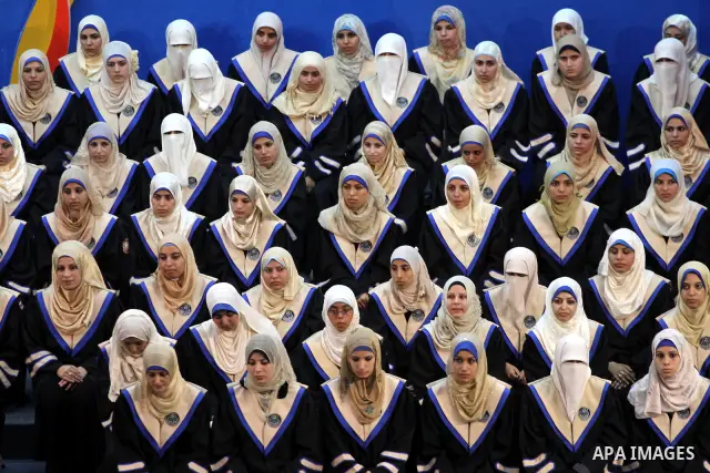 Palestinian students participate in their graduation ceremony at the Islamic University in Gaza city on July 4,2011. Photo by Mohammed Asad