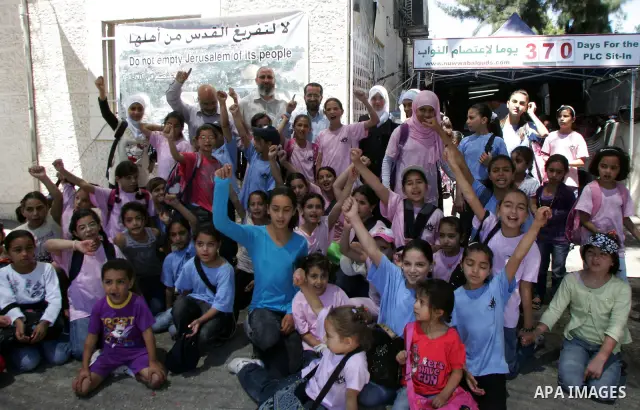 Palestinian children participating in summer camps visit Hamas legislators at the International Red Cross offices in Jerusalem's old city on july 5, 2011. Hamas legislators have been living inside the ICRC compound in Je...
