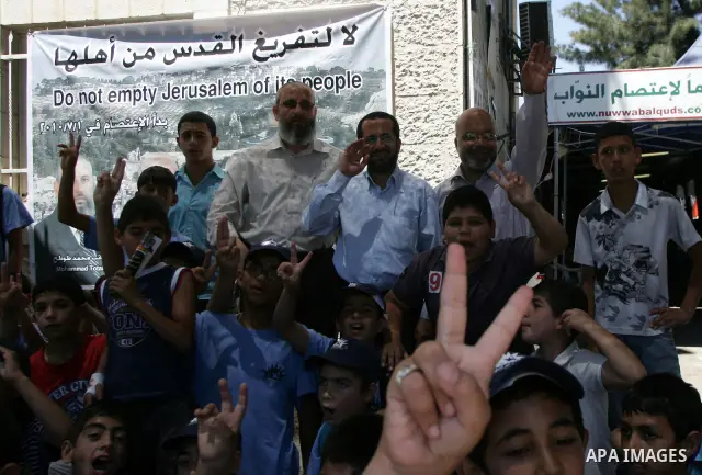 Palestinian children participating in summer camps visit Hamas legislators at the International Red Cross offices in Jerusalem's old city on july 5, 2011. Hamas legislators have been living inside the ICRC compound in Je...