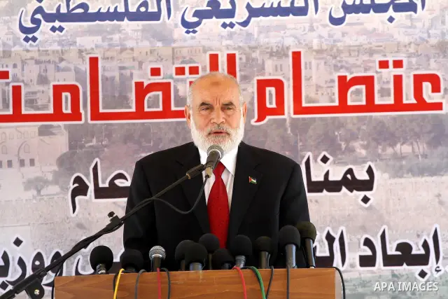 A Member of the Palestinian Legislative Council delivers speech during a protest in Gaza City on July 6, 2011. In support with Hamas legislators have been living inside the ICRC compound in Jerusalem for the past one yea...