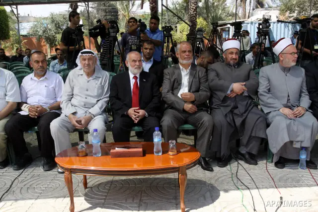 Palestinian Legislative Council members take part in a protest in Gaza City on July 6, 2011. In support with Hamas legislators have been living inside the ICRC compound in Jerusalem for the past one year fearing expulsio...