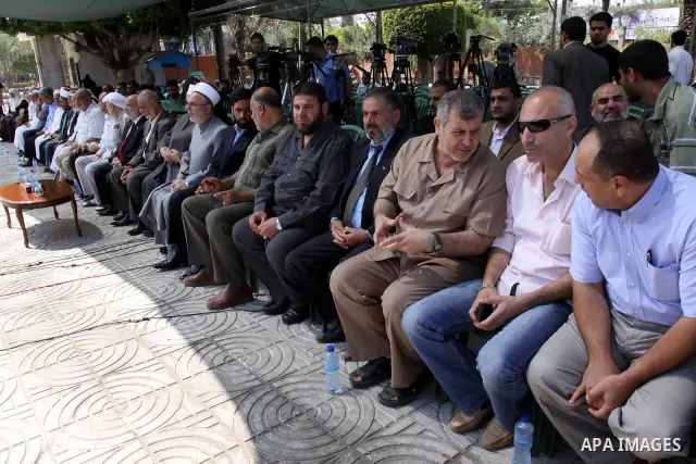 Palestinian Legislative Council members take part in a protest in Gaza City on July 6, 2011. In support with Hamas legislators have been living inside the ICRC compound in Jerusalem for the past one year fearing expulsio...