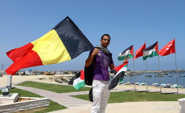 Palestinians take part in a rally to show solidarity with the "Freedom Flotilla II" at Gaza seaport July 6, 2011. Pro-Palestinian activists hoping to sail to Gaza this week fully expected their flotilla to be blocked by...