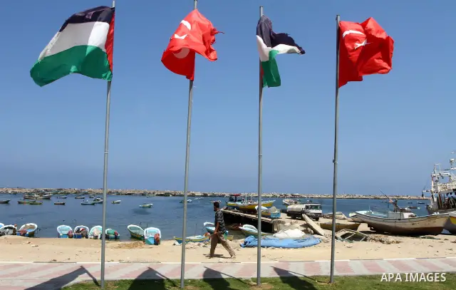 Palestinians take part in a rally to show solidarity with the "Freedom Flotilla II" at Gaza seaport July 6, 2011. Pro-Palestinian activists hoping to sail to Gaza this week fully expected their flotilla to be blocked by...