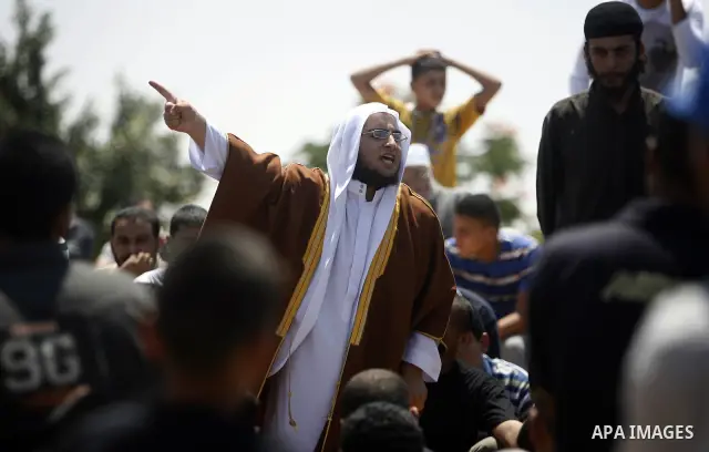 Palestinian relatives mourn the body of Kamal Hamdan Muammar, 28-years-old, for burial following prayers at the mosque in the Rafah refugee camp, in the southern of Gaza Strip, on July 6, 2011, after being killed along w...
