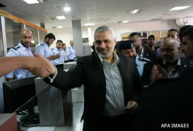 Palestinian Prime Minister in Gaza Strip, Ismail Haniya visits the travellers leaving the Gaza Strip through the Rafah crossing into Egypt during his visit to the Rafah border crossing in the southern Gaza Strip on July...