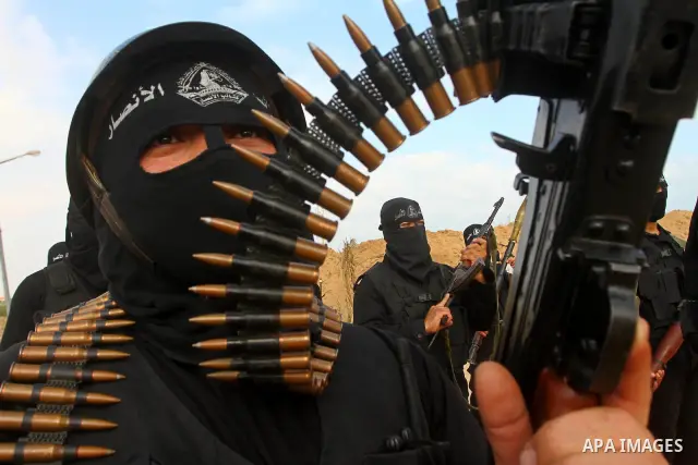 Palestinian militants from Al-Ansar brigades, the armed wing of Al-Ahrar movement, demonstrate their skills during a drill in front of the media in Khan Younis in the southern Gaza Strip July 7, 2011. Photo by Ashraf Amr...
