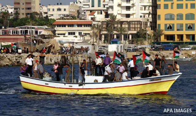 Palestinians take Part during a protest in the port at Gaza City on July 7, 2011. Pro-Palestinian activists hoping to sail to Gaza this week fully expected their flotilla to be blocked by Israeli marines. Photo by Ashraf...