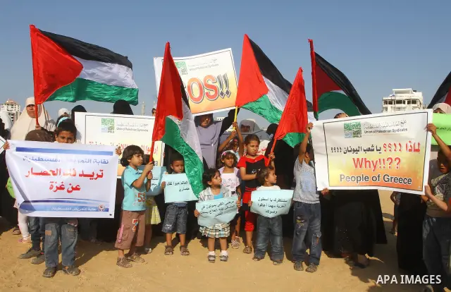Palestinians take Part during a protest in the port at Gaza City on July 7, 2011. Pro-Palestinian activists hoping to sail to Gaza this week fully expected their flotilla to be blocked by Israeli marines. Photo by Ashraf...