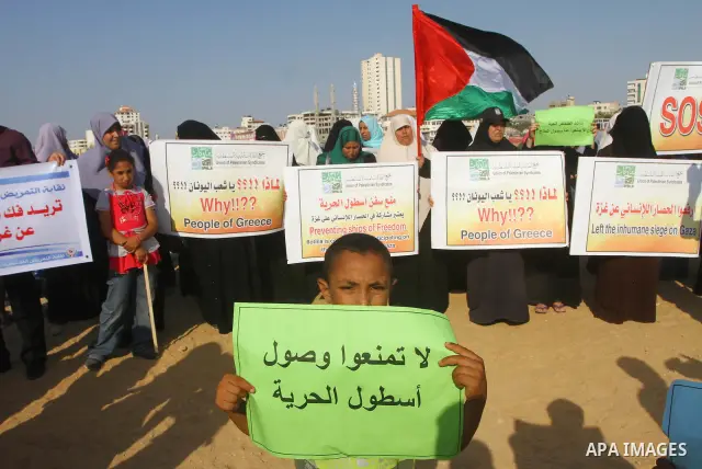 Palestinians take Part during a protest in the port at Gaza City on July 7, 2011. Pro-Palestinian activists hoping to sail to Gaza this week fully expected their flotilla to be blocked by Israeli marines. Photo by Ashraf...