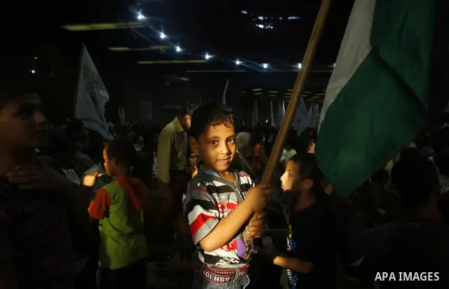Palestinians celebrate four-year anniversary of al-Ahrar Brigades in Gaza City on July 07, 2011. Photo by Mahmud Nassar. Photo by Mahmud Nassar