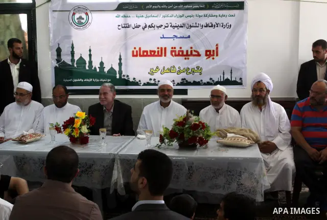 Palestinian Prime Minister in Gaza Strip, Ismail Haniya attends the opening celebration of a new mosque in Gaza city on July 8,2011, as he speaks about the latest political developments. Photo by Mohammed Asad