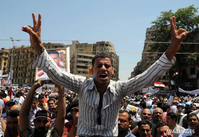 Protesters gather in Tahrir square in Cairo July 8, 2011. Thousands of Egyptians gathered in Cairo's Tahrir Square on Friday to demand faster reforms and the swifter prosecution of former officials from Hosni Mubarak's t...