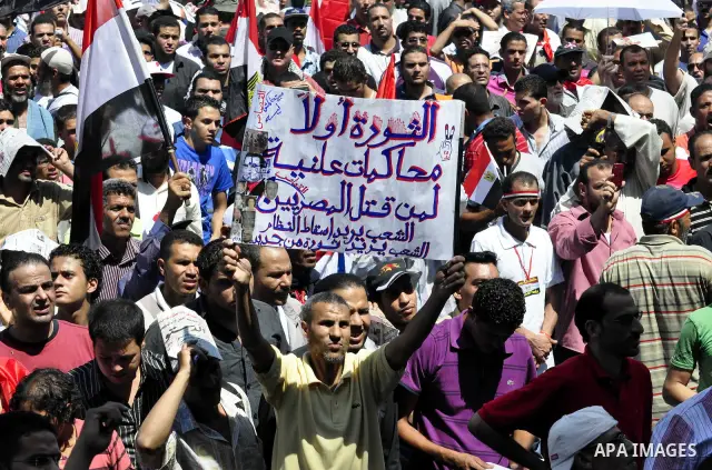 Protesters gather in Tahrir square in Cairo July 8, 2011. Thousands of Egyptians gathered in Cairo's Tahrir Square on Friday to demand faster reforms and the swifter prosecution of former officials from Hosni Mubarak's t...