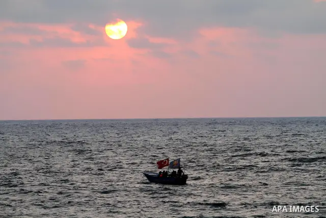 A Palestinian fishing boat as the sun goes down off a beach in Gaza City on July 8, 2011. Reports state that during the summer the beach is a major venue for entertainment and leisure in the Gaza. Photo by Mohammed Asad