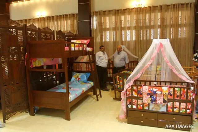 Palestinian vendors display their furniture during an exhibition at Al-Shalehat in Gaza city beach on July 10, 2011 Photo by Ashraf Amra