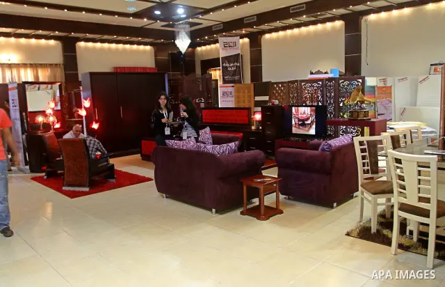 Palestinian vendors display their furniture during an exhibition at Al-Shalehat in Gaza city beach on July 10, 2011 Photo by Ashraf Amra