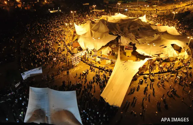Hundreds of demonstrators gather as they spend their second night in Cairo's Tahrir Square, on July 10, 2011, at the landmark square vowing to keep up their sit-in despite a series of concessions by the Egyptian prime mi...