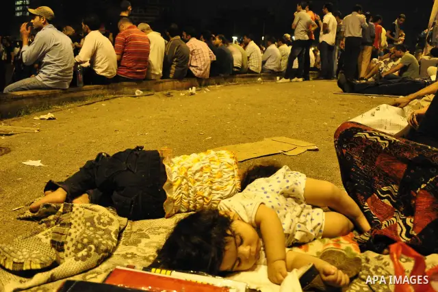 Hundreds of demonstrators gather as they spend their second night in Cairo's Tahrir Square, on July 10, 2011, at the landmark square vowing to keep up their sit-in despite a series of concessions by the Egyptian prime mi...