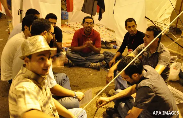 Hundreds of demonstrators gather as they spend their second night in Cairo's Tahrir Square, on July 10, 2011, at the landmark square vowing to keep up their sit-in despite a series of concessions by the Egyptian prime mi...