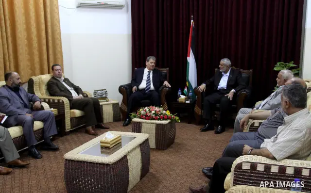 Palestinian Prime Minister in Gaza Strip, Ismail Haniya meets with senior Fatah official, Rouhi Fatoh at his office in Gaza City on July 11, 2010. Fatoh, a leader of Palestinian President Mahmoud Abbas's Fatah group, tra...