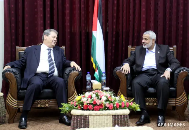 Palestinian Prime Minister in Gaza Strip, Ismail Haniya meets with senior Fatah official, Rouhi Fatoh at his office in Gaza City on July 11, 2010. Fatoh, a leader of Palestinian President Mahmoud Abbas's Fatah group, tra...