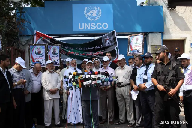 Palestinian Hamas legislators deliver speech during a protest in front of UNRWA headquarters in Gaza city on July 12, 2011 in support with Jerusalem's parliament members who have been living inside the ICRC compound in J...
