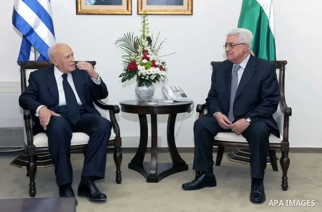 Palestinian President Mahmoud Abbas (Abu Mazen) meets with Greek President Karolos Papoulias in the West Bank city of Ramallah on July 12, 2011. Photo by Thaer Ganaim