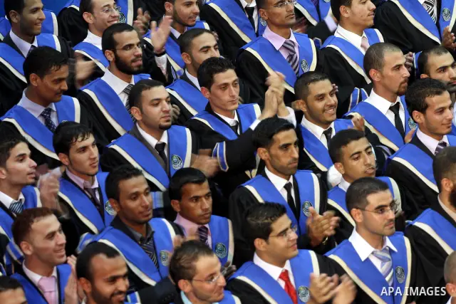 Palestinian students participate in their graduation ceremony at the Islamic University in Gaza city on July 12, 2011. Photo by Mohammed Asad