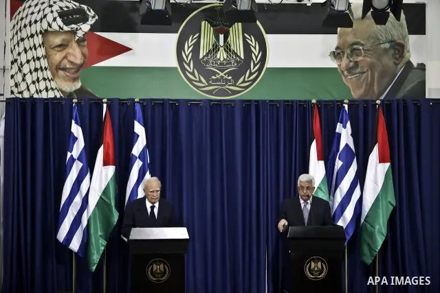 Palestinian president Mahmoud Abbas (Abu Mazen) and Greek President Karolos Papoulias give a press conference in the West Bank city of Ramallah on July 12, 2011 during an official visit by the latest to the Palestinian t...