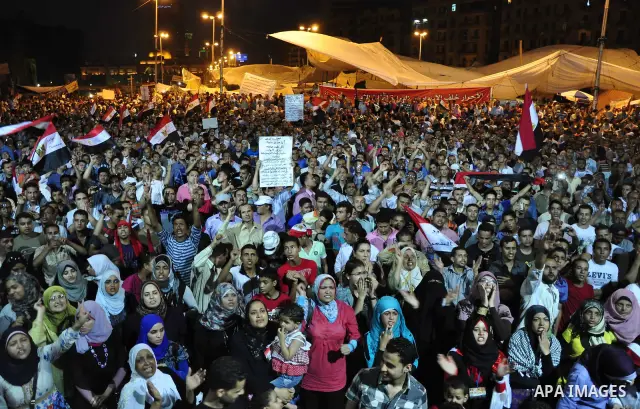 Egyptians are gathered at one of the Tharir square entrances where a sit-in is taking place, Cairo, Egypt, 12 July 2011. Egypt's military rulers on 12 July warned protesters against "harming public interests" after they...