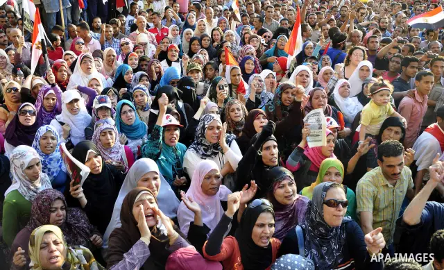 Egyptians are gathered at one of the Tharir square entrances where a sit-in is taking place, Cairo, Egypt, 12 July 2011. Egypt's military rulers on 12 July warned protesters against "harming public interests" after they...