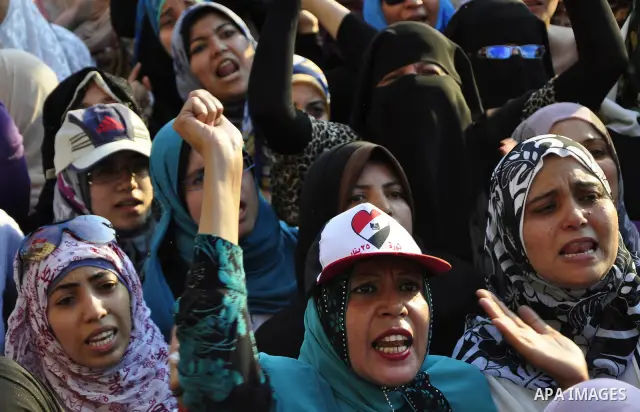 Egyptians are gathered at one of the Tharir square entrances where a sit-in is taking place, Cairo, Egypt, 12 July 2011. Egypt's military rulers on 12 July warned protesters against "harming public interests" after they...